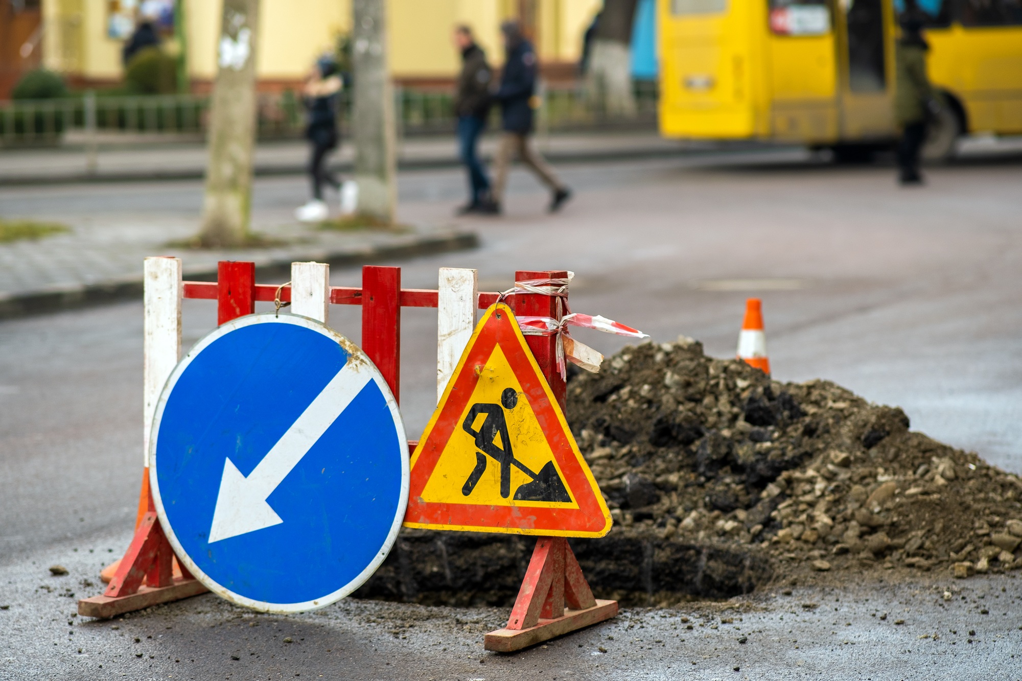 Warning street sign on road work site